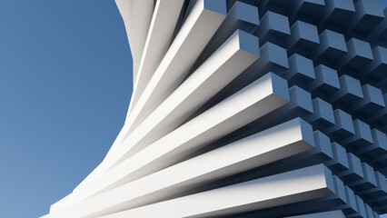 A modern white architectural facade against a clear blue sky